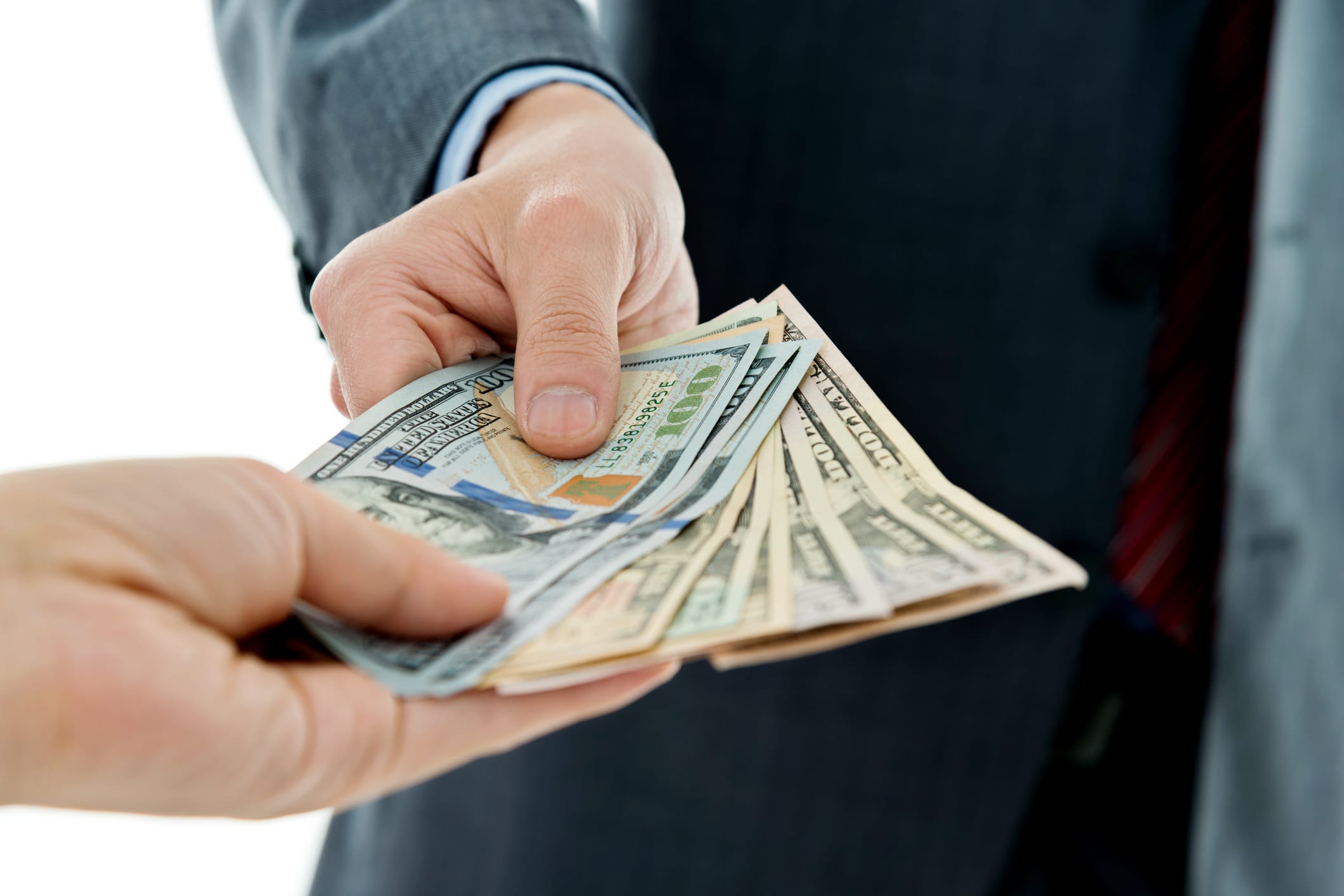 businessman hands giving money.